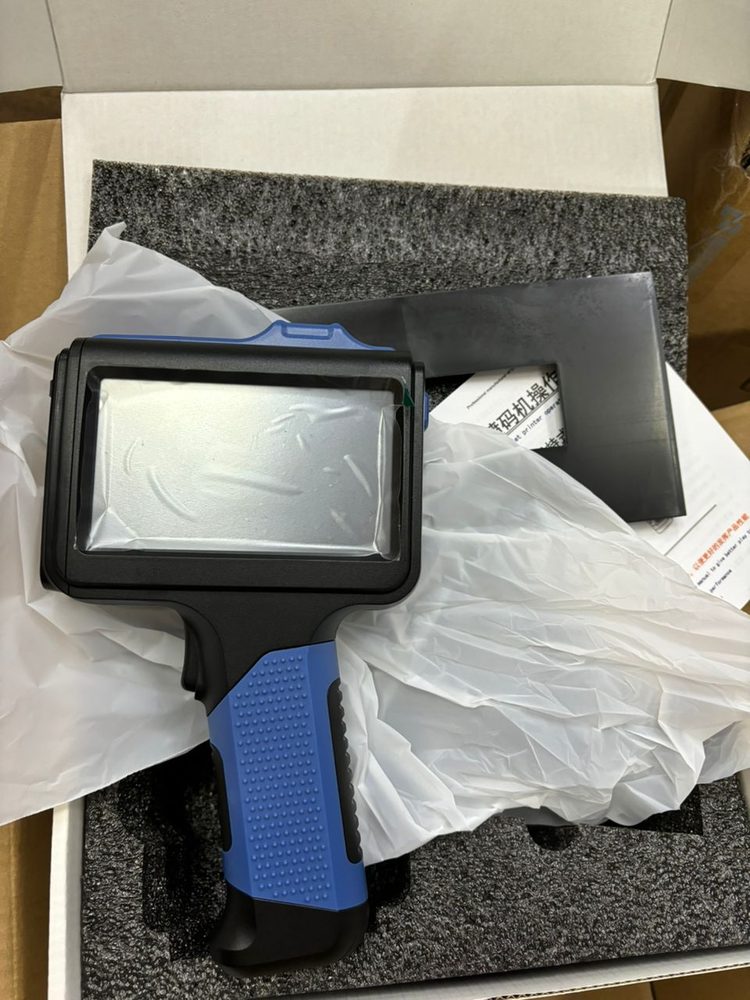 Handheld inkjet printer